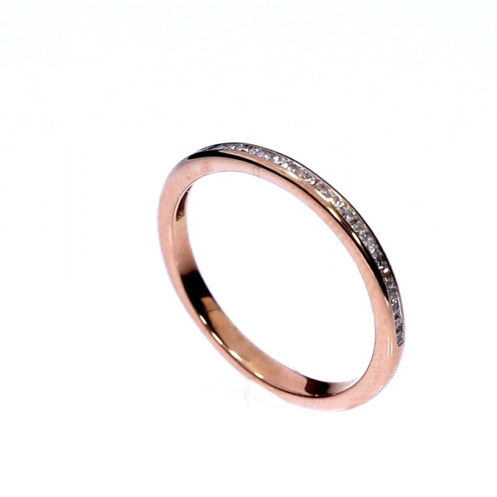 Golden ring with precious stones