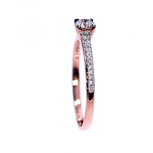 Golden ring with precious stones