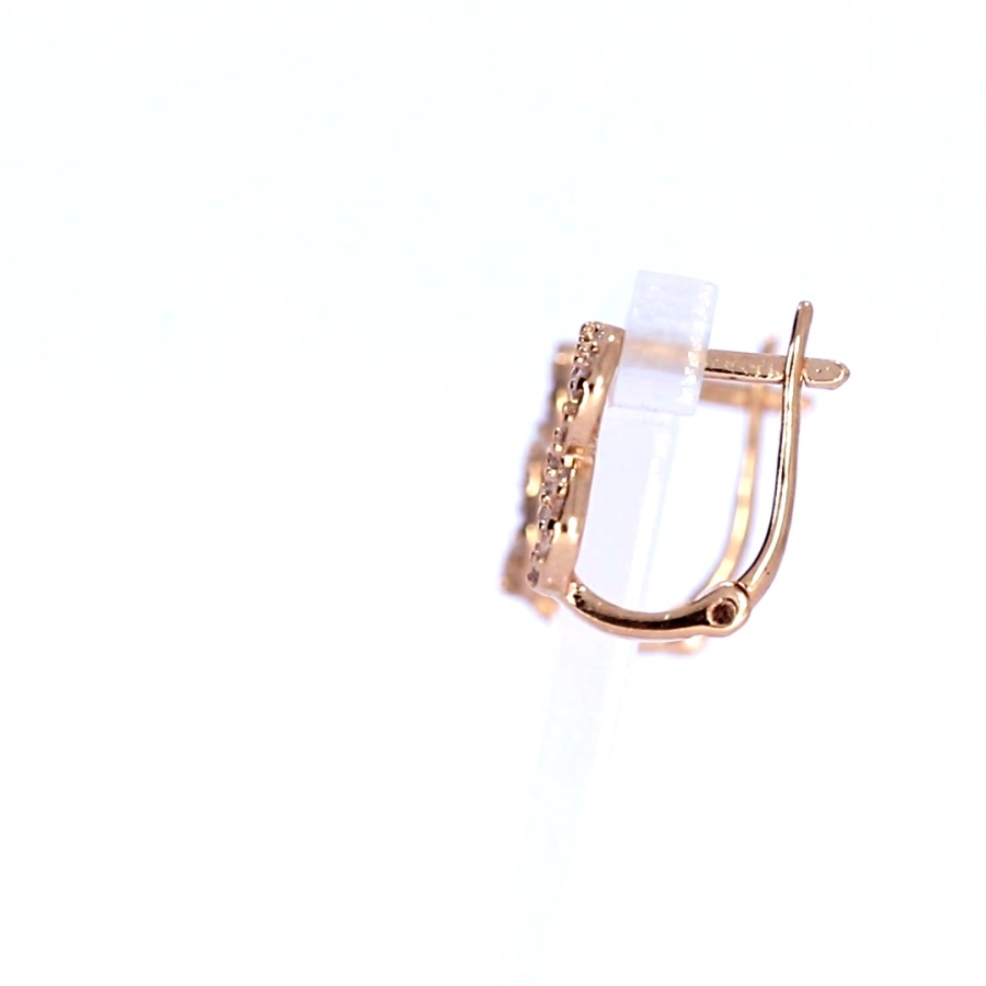 Gold earrings with zircon