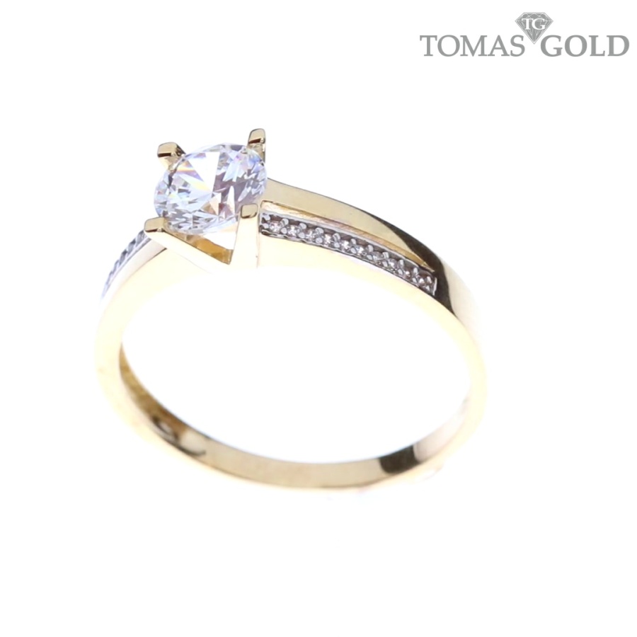 Gold ring with zircon