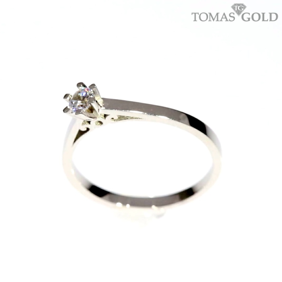 Golden ring with zircon