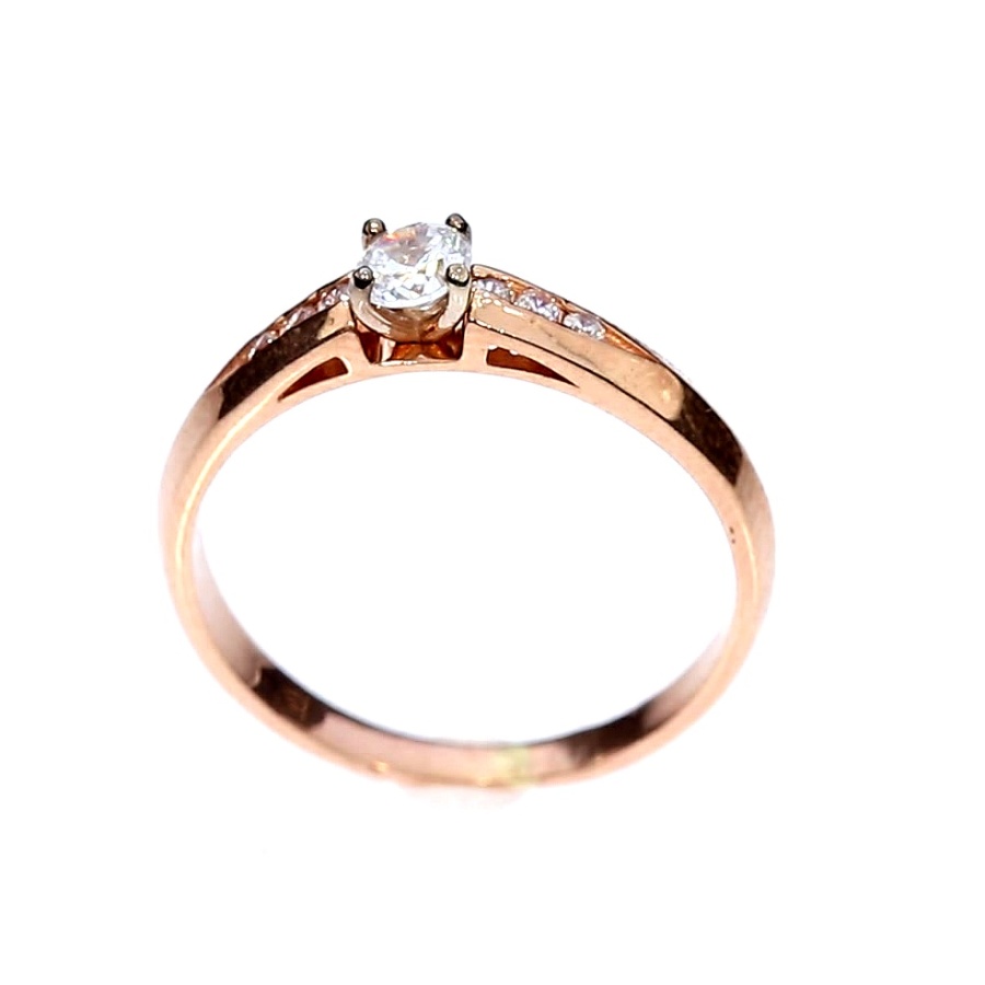 Golden ring with zircon