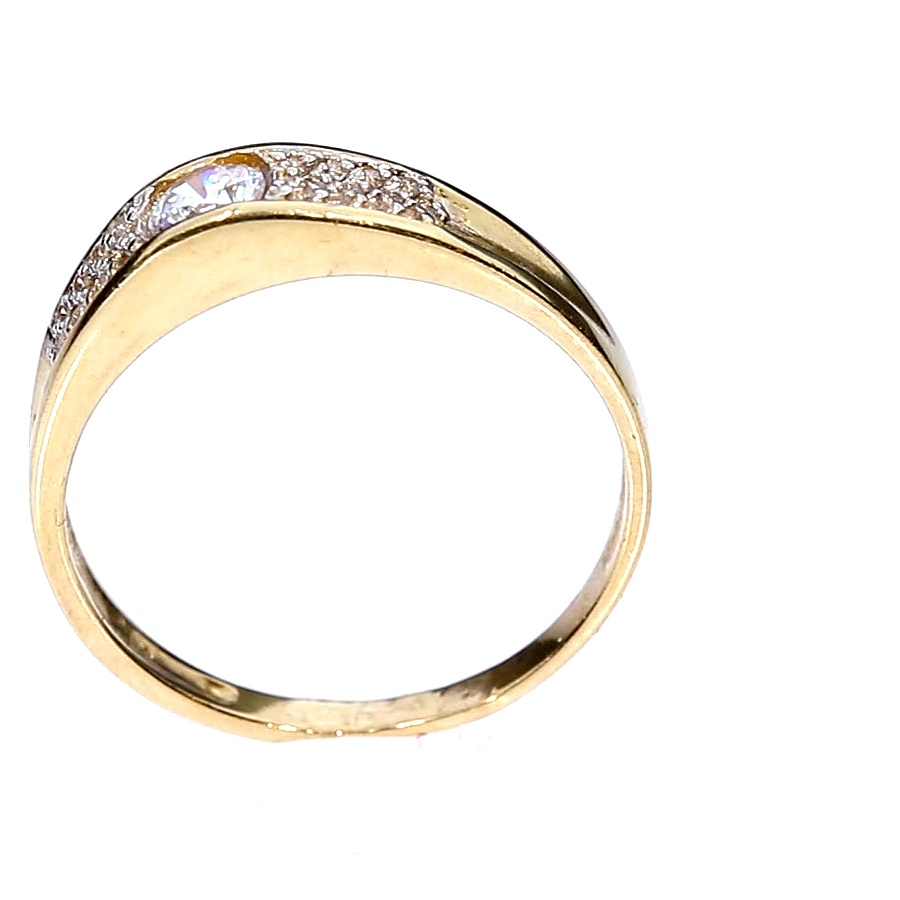 Golden ring with zircon
