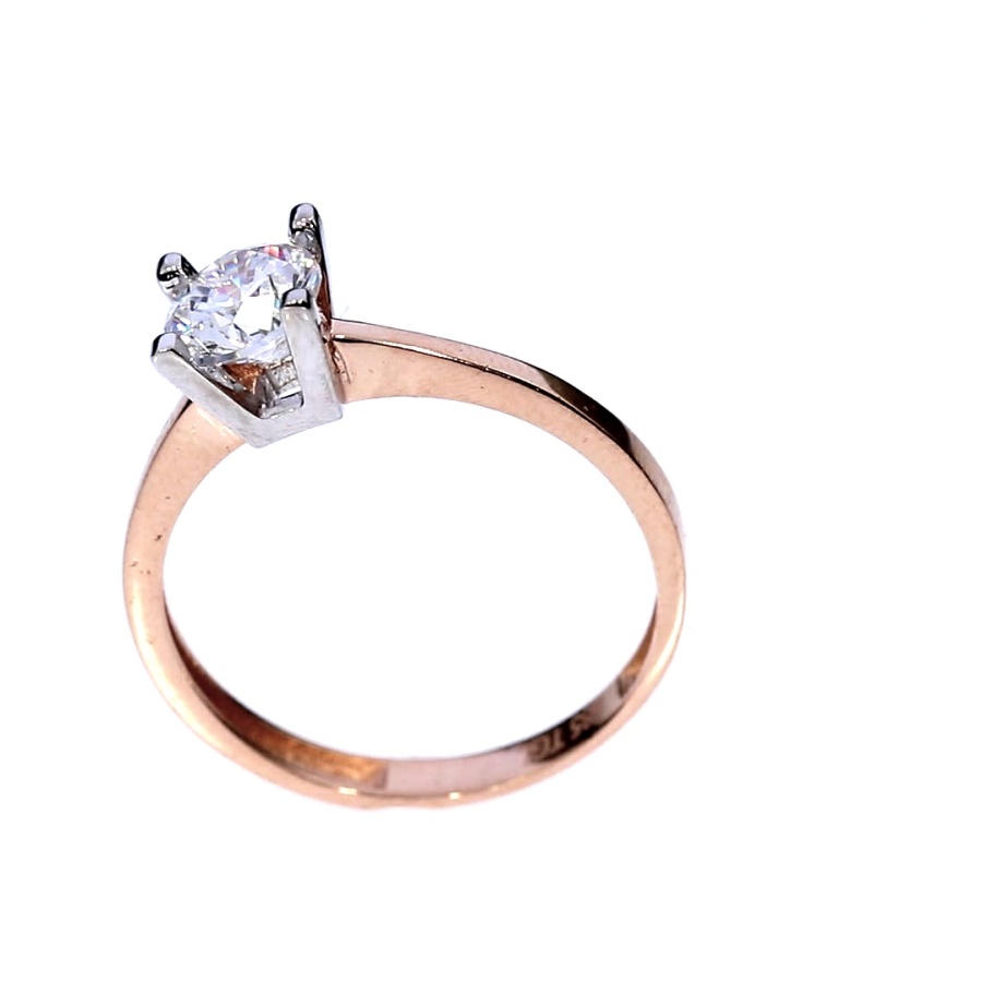 Golden ring with zircon