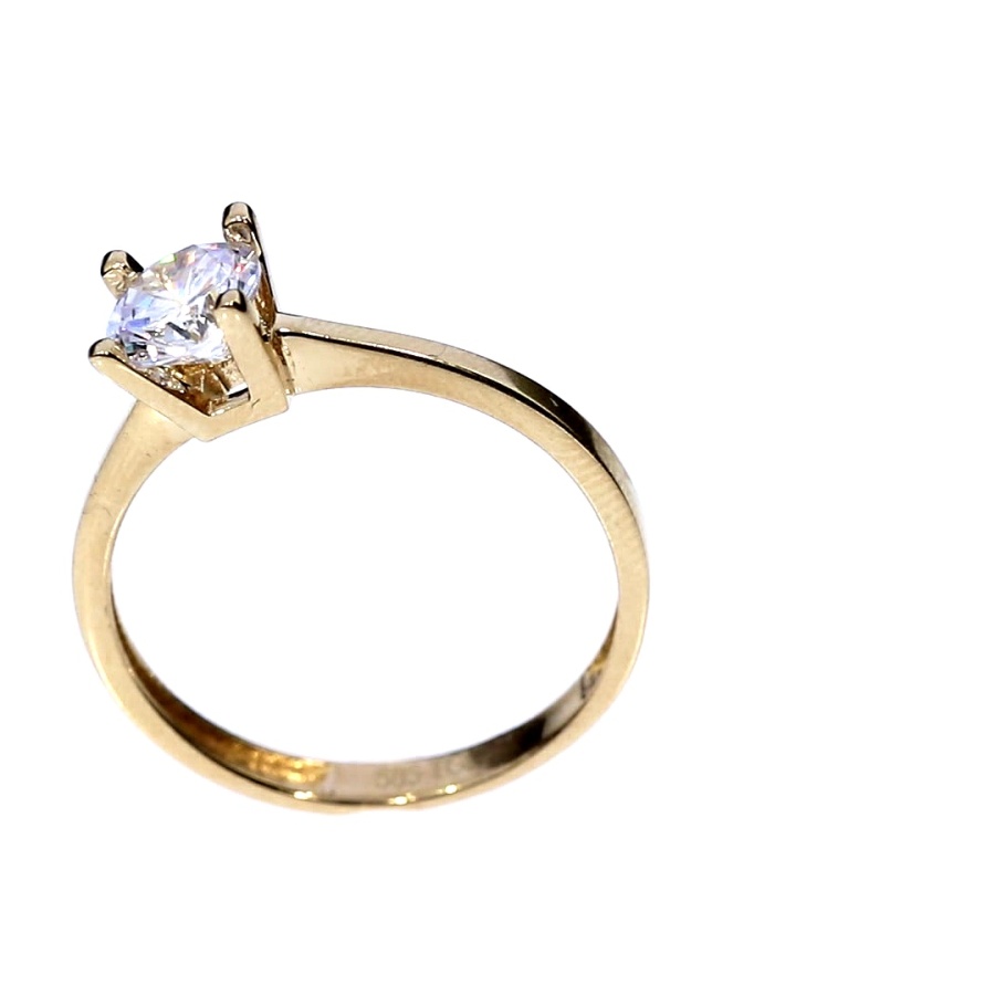 Golden ring with zircon