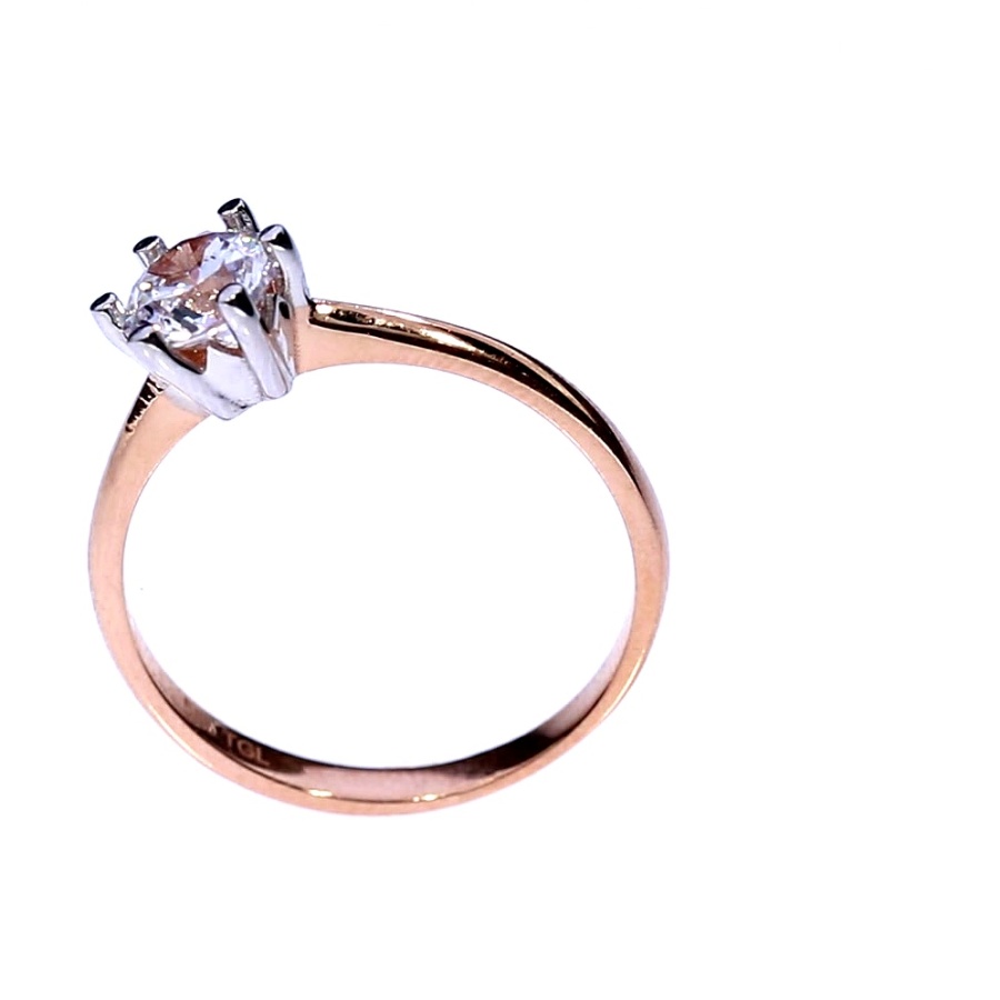 Golden ring with zircon