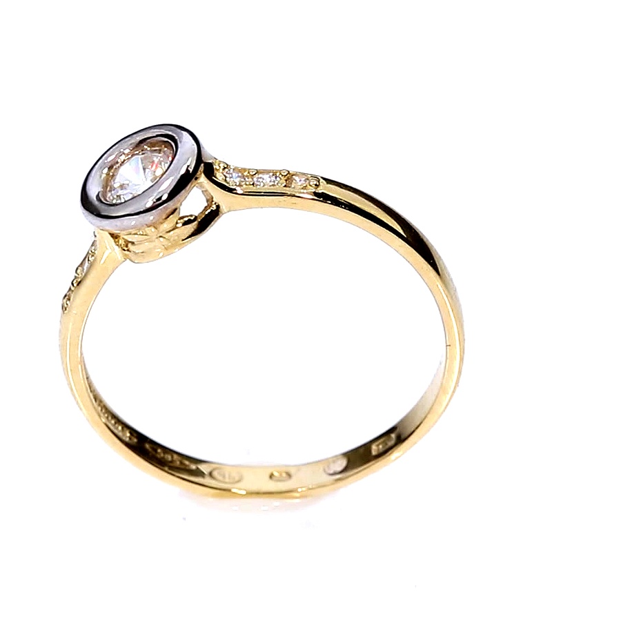 Golden ring with zircon