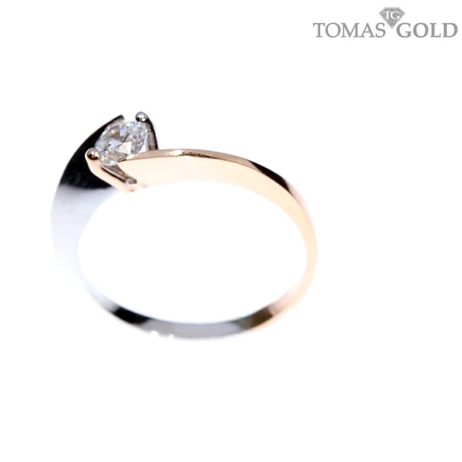 Golden ring with zircon
