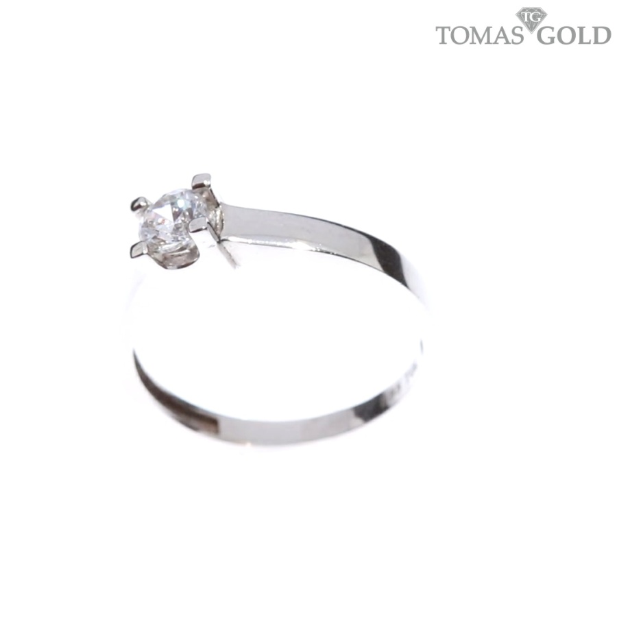 Gold ring with zircon