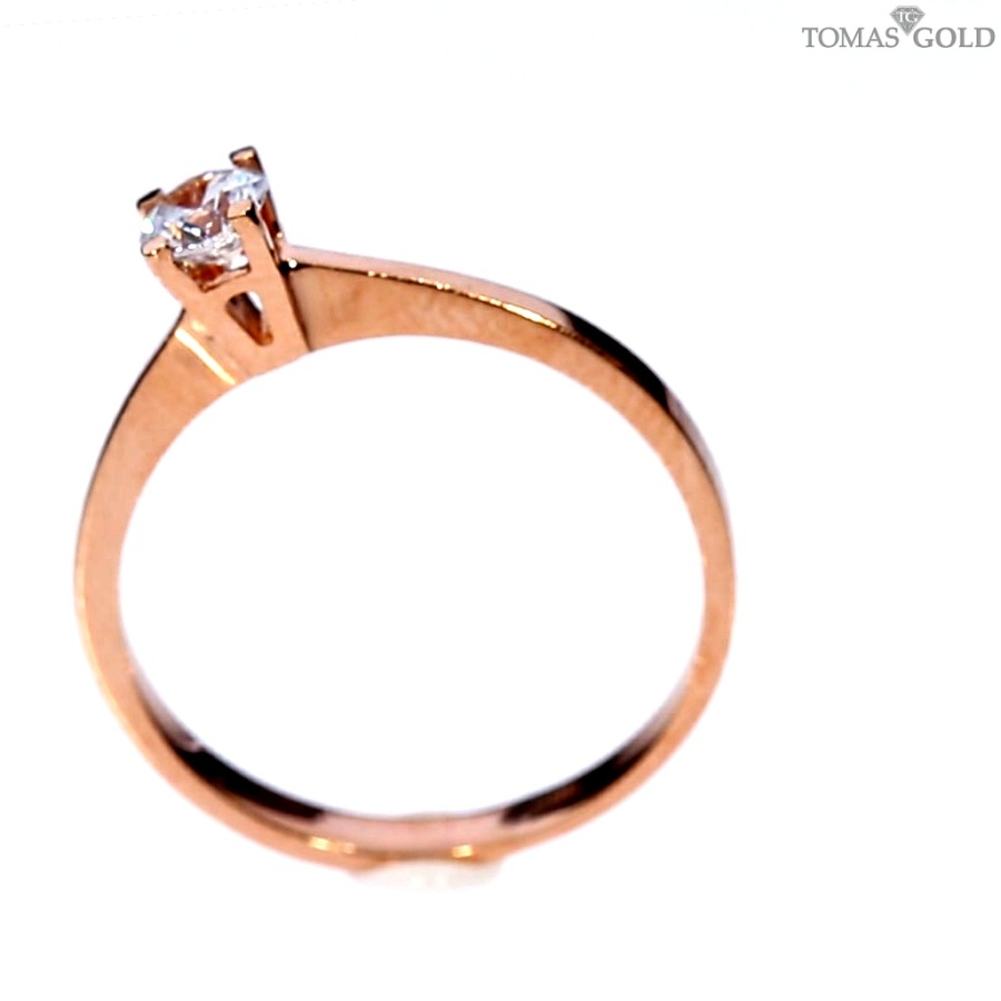Golden ring with zircon