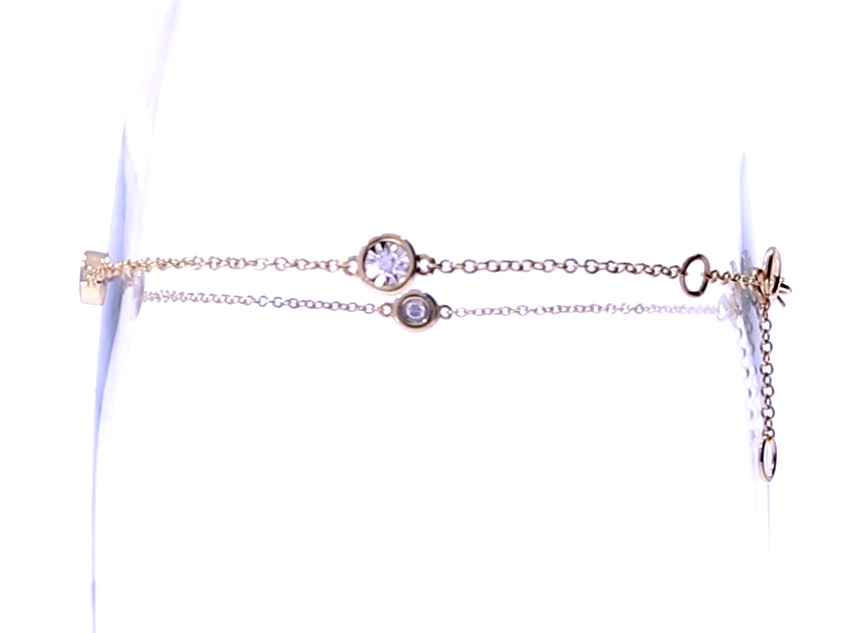 Золотой браслет с драгоценными камнями