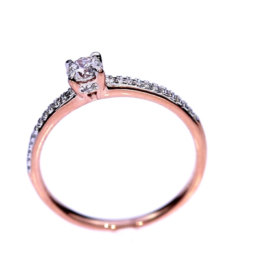 Golden ring with precious stones